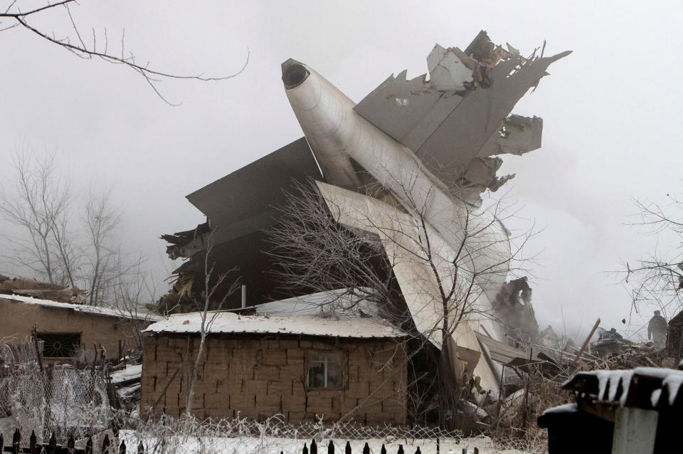 <p>JAN. 16, 2017 – Plane debris is seen at the crash site of a Turkish cargo jet near Kyrgyzstan’s Manas airport outside Bishkek. (Photo: Vladimir Pirogov/Reuters) </p>