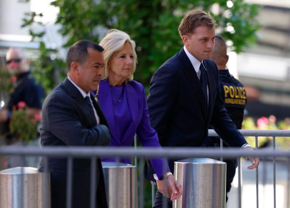 Jill Biden seen arriving in court flanked by security guards and police