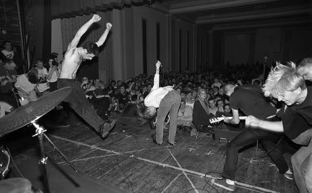 <p>Jim Saah</p> Fugazi and Amy Pickering live in 1990