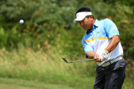 MELBOURNE, AUSTRALIA - NOVEMBER 18: K.J. Choi of the International Team chips to the eighth green during the Day Two Four-Ball Matches of the 2011 Presidents Cup at Royal Melbourne Golf Course on November 18, 2011 in Melbourne, Australia. (Photo by Scott Halleran/Getty Images)