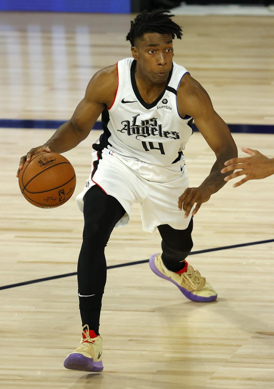 The Clippers' Terance Mann drives against the Thunder on Aug. 14, 2020.