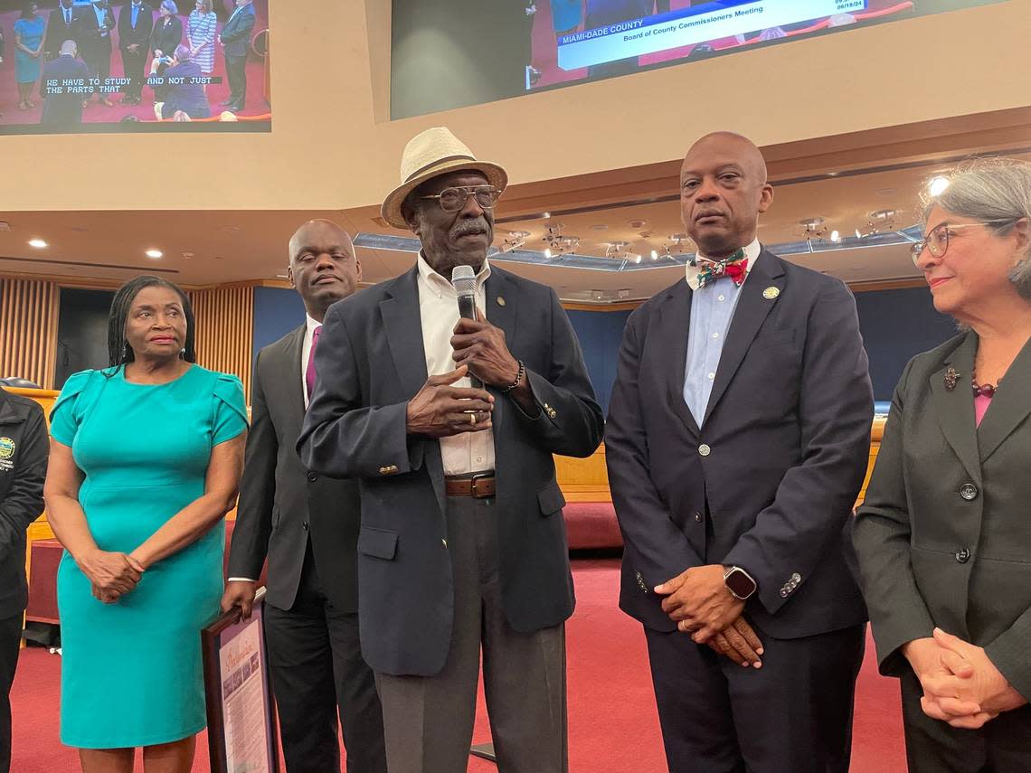 Wilbur Bell addresses the audience at the Miami-Dade County Commission on Tuesday, June 18, 2024, after receiving a proclamation honoring his family history. The presentation followed a CNN segment on Bell’s quest to document that his father was born into slavery in 1865 in Georgia. Behind Bell, from left to right, are County Commissioners Marleine Bastien, Kionne McGhee and Oliver Gilbert, and the county’s mayor, Daniella Levine Cava.