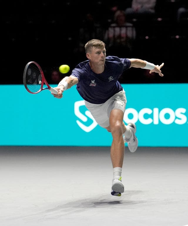 Billy Harris lunges for a forehand 