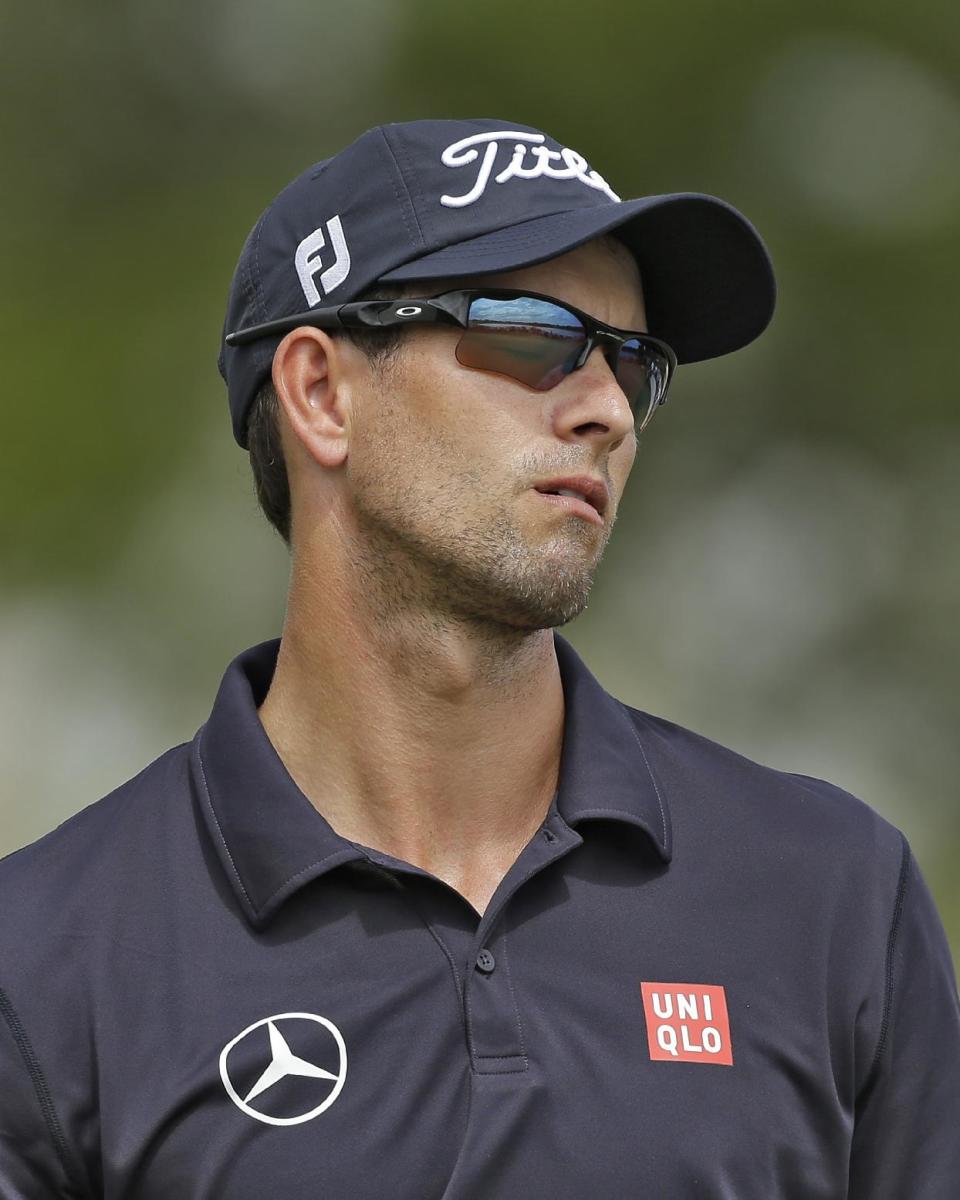 Adam Scott, of Australia, reacts to a missed birdie putt on the fifth hole during the final round of the Arnold Palmer Invitational golf tournament at Bay Hill, Sunday, March 23, 2014, in Orlando, Fla. (AP Photo/Chris O'Meara)