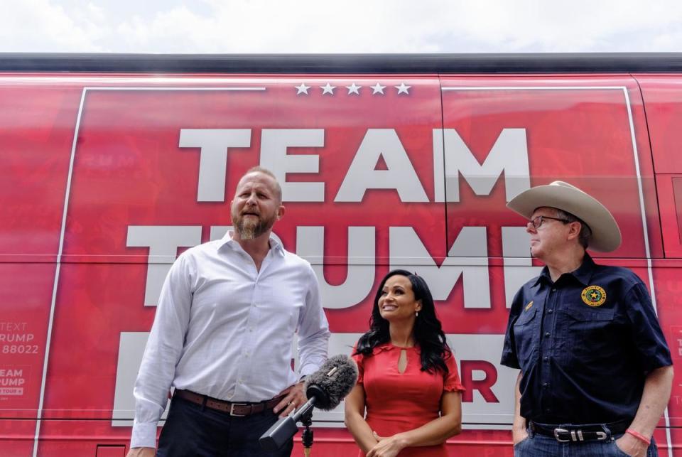 Trump supporters greet campaign surrogates and former campaign manager Brad Parscale, senior advisor Katrina Pierson and Lt. Gov. Dan Patrick during a bus tour stop in San Antonio on Sept. 3, 2020.