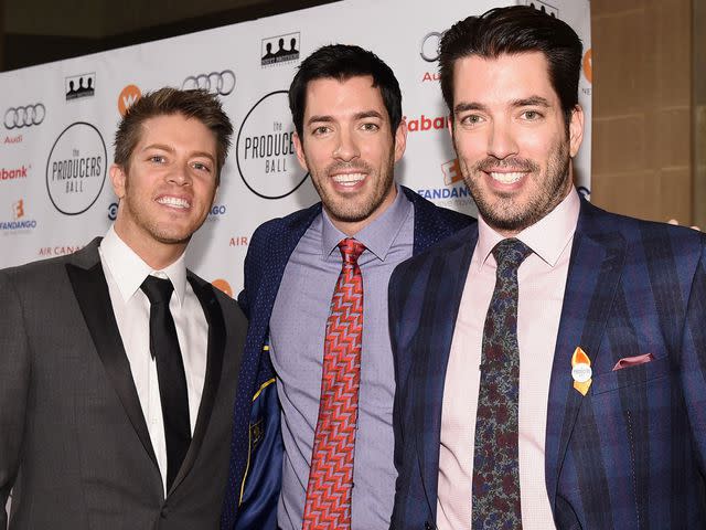 <p>Mike Windle/Getty</p> JD Scott. Drew Scott, and Jonathan Scott attend the 5th Annual Producers Ball on September 11, 2015 in Toronto, Canada.