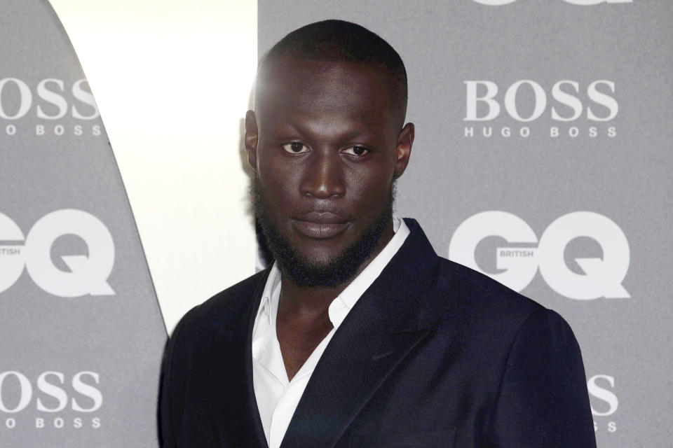 Musician Stormzy poses for photographers on arrival at the GQ Men of the year Awards in central London on Tuesday, Sept. 3, 2019. (Photo by Grant Pollard/Invision/AP)