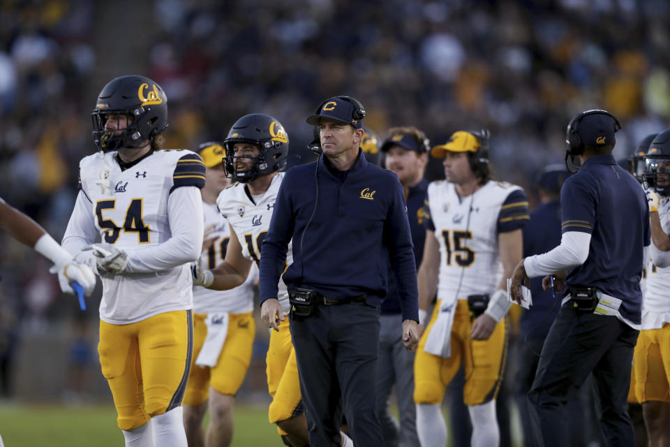 California coach Justin Wilcox, center, stands on the sidelines during the first half of the team's NCAA college football game against Stanford in Stanford, Calif., Saturday, Nov. 20, 2021. (AP Photo/Jed Jacobsohn)