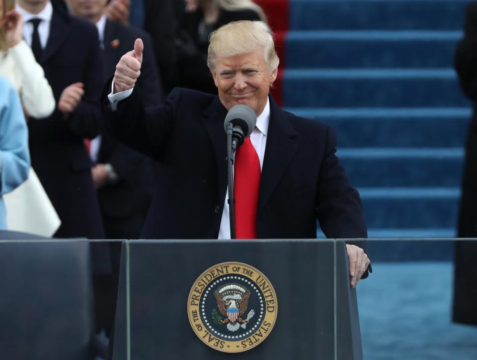 <p>President Donald Trump gives a thumbs up after being sworn in as the 45th president of the United States on the West front of the U.S. Capitol in Washington on Jan.20, 2017. (Photo: Carlos Barria/Reuters) </p>