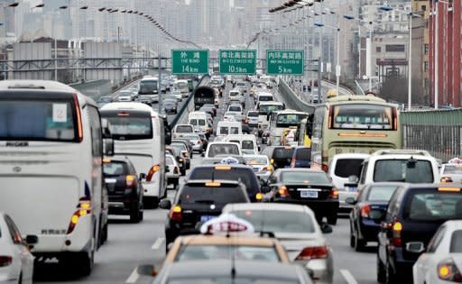 Heavy traffic head toward downtown Shanghai in 2010. The US consulate in Shanghai has begun issuing its own pollution statistics, giving a much more pessimistic assessment of the city's air quality than official Chinese data