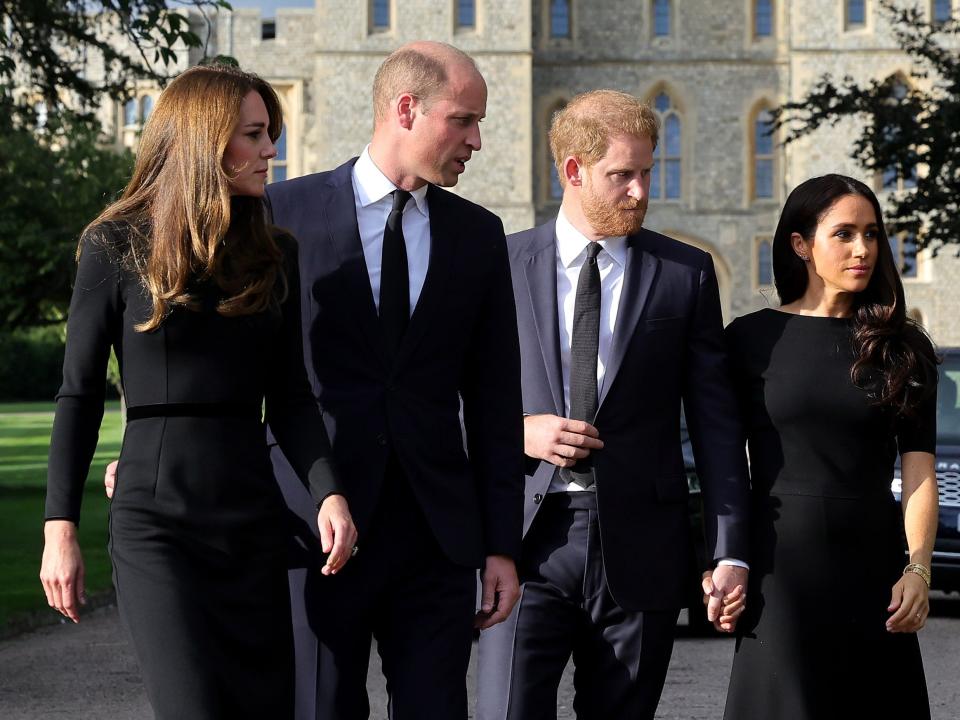 Catherine, Princess of Wales, Prince William, Prince of Wales, Prince Harry, Duke of Sussex, and Meghan, Duchess of Sussex on the long Walk at Windsor Castle arrive to view flowers and tributes to HM Queen Elizabeth on Saturday.