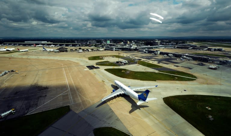 Manchester Airport, the third-busiest in Britain, cancelled over 100 flights affecting thousands of passengers Sunday following a major power cut (PAUL ELLIS)