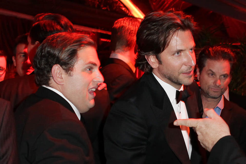 Jonah Hill and Bradley Cooper attend the The Weinstein Company's 2013 Golden Globe Awards after party presented by Chopard, HP, Laura Mercier, Lexus, Marie Claire, and Yucaipa Films held at The Old Trader Vic's at The Beverly Hilton Hotel on January 13, 2013 in Beverly Hills, California.