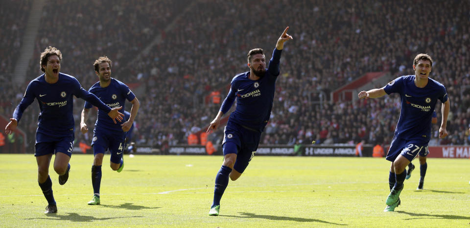 Chelsea’s Olivier Giroud, center, celebrates scoring his side’s third goal of the game during their English Premier League soccer match against Southampton at St Mary’s Stadium, Southampton, England, Saturday, April 14, 2018. (Adam Davy/PA via AP)
