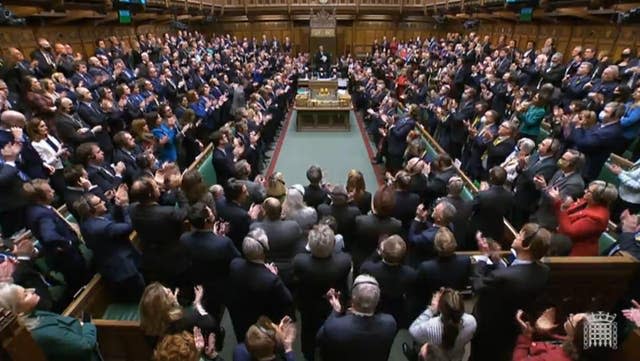 MPs give a standing ovation after Ukrainian President Volodymyr Zelensky addressed MPs