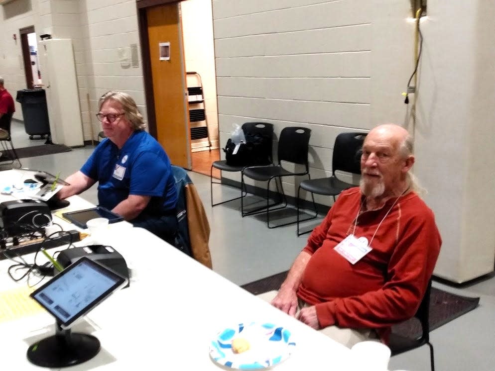 Poll workers Ben Pyle, left, and Bobby Sessums were on duty to assist voters at Rankin County's Crossgates United Methodist Church precinct Tuesday in Brandon.