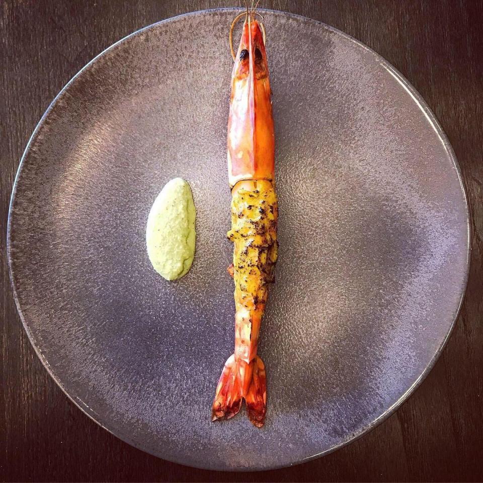 A king prawn served with mustard and coconut at Opheem