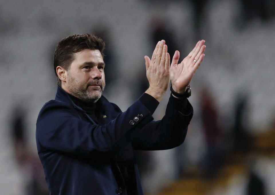 Tottenham's manager Mauricio Pochettino applauds fans after the Champions League group B soccer match between Red Star and Tottenham, at the Rajko Mitic Stadium in Belgrade, Serbia, Wednesday, Nov. 6, 2019. (AP Photo/Darko Vojinovic)