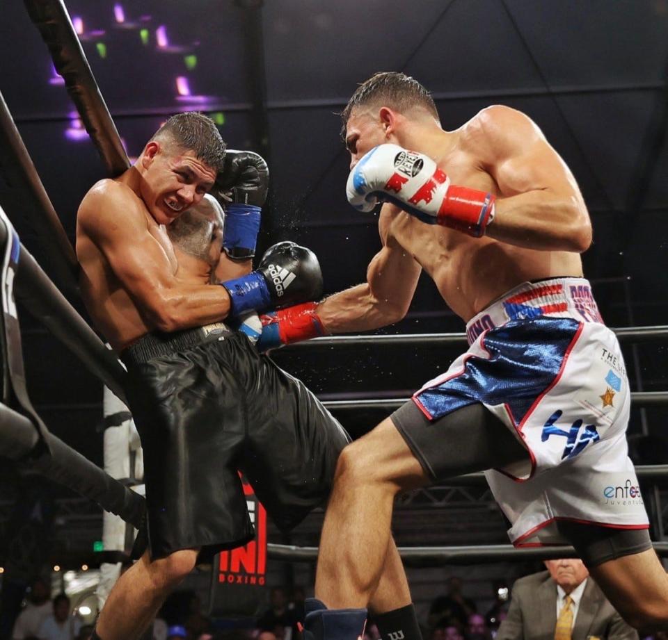 Luis Angel Feliciano scores a body punch against Alejandro Frias Rodriguez on Aug. 19, 2022 at the Commerce Casino in Commerce, California. Feliciano won the fight by majority decision.