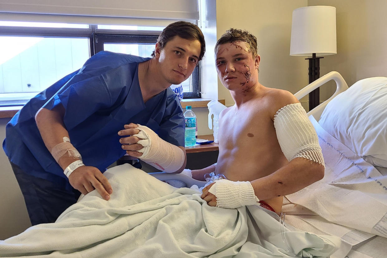 Brady Lowry and Kendell Cummings at the hospital. (via KSL 5 TV)