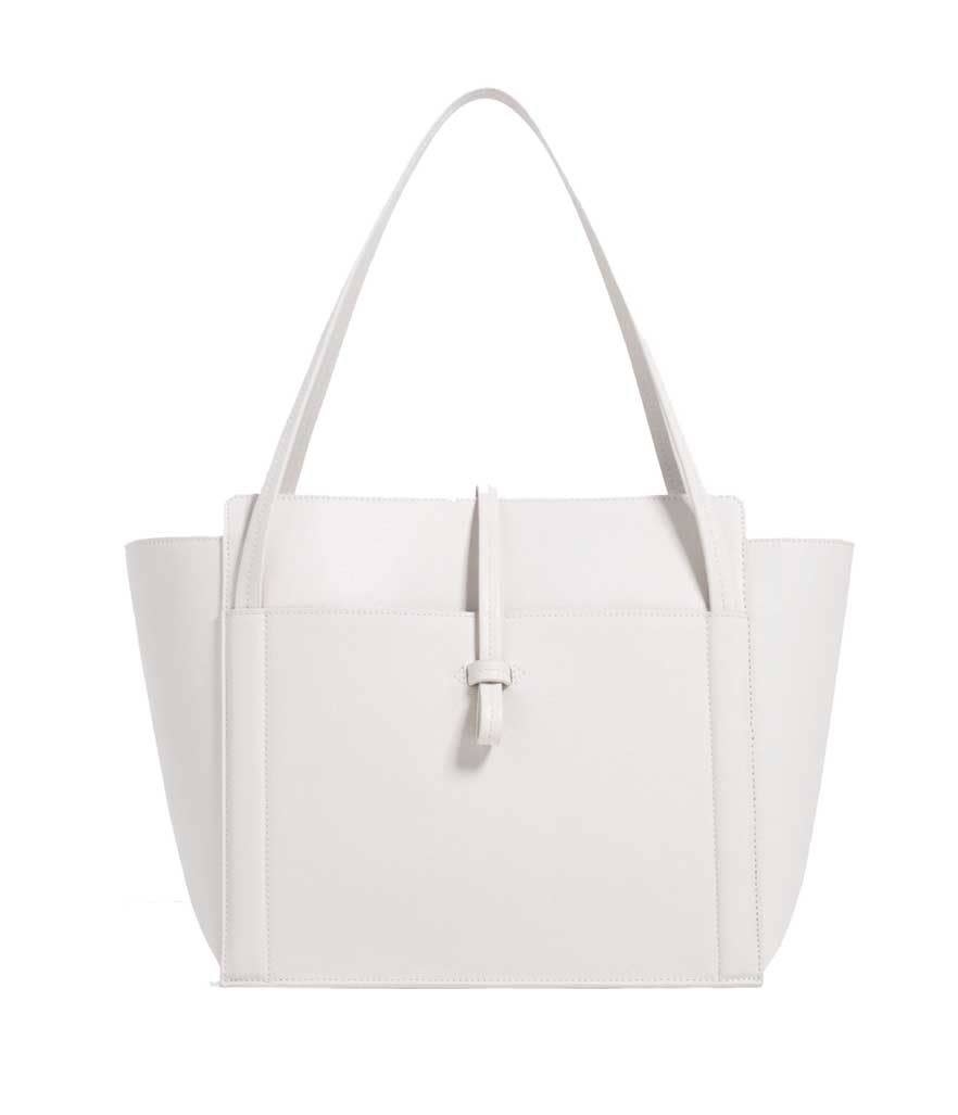 <p>Tote With Front Pocket, $26,<a href="http://www.zara.com/us/en/sale/woman/bags/view-all/tote-with-front-pocket-c734174p3797002.html" rel="nofollow noopener" target="_blank" data-ylk="slk:zara.com;elm:context_link;itc:0;sec:content-canvas" class="link "> zara.com</a></p>