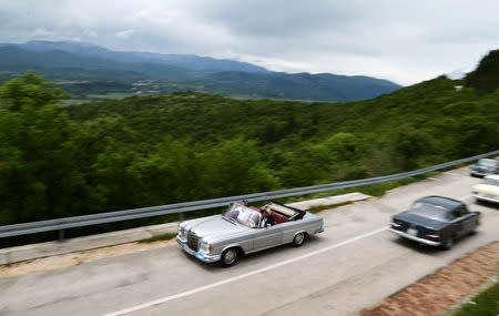 Oldtimer Mercedes cars are seen driving in Imotski, Croatia, May 19, 2019. REUTERS/Antonio Bronic