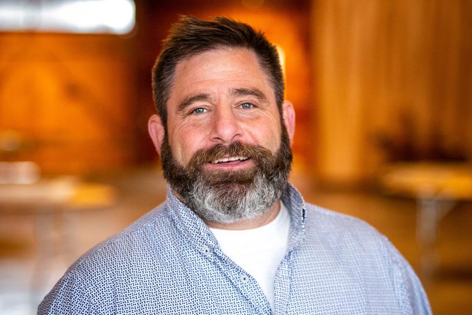 Seth Zimmermann, Johnson County Supervisor candidate, poses for a photo, Wednesday, April 20, 2022, at the Celebration Barn in Newport Township, Iowa.