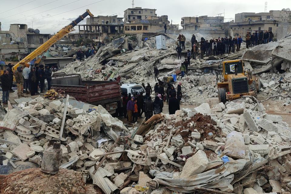 Search and rescue teams continue their work at the collapsed buildings, in Idlib, Syria (Anadolu Agency/Getty)