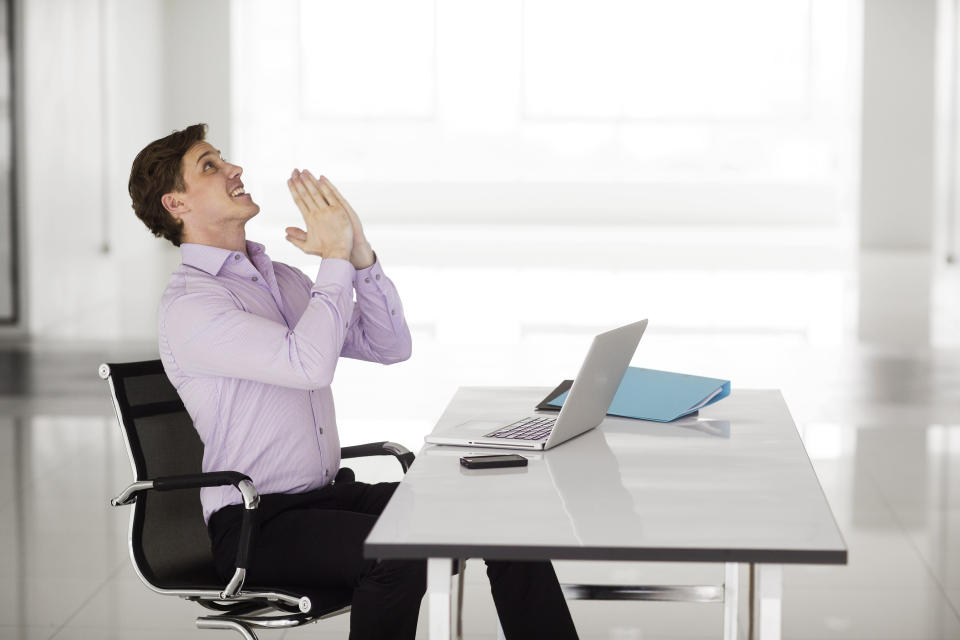 Smiling man in office