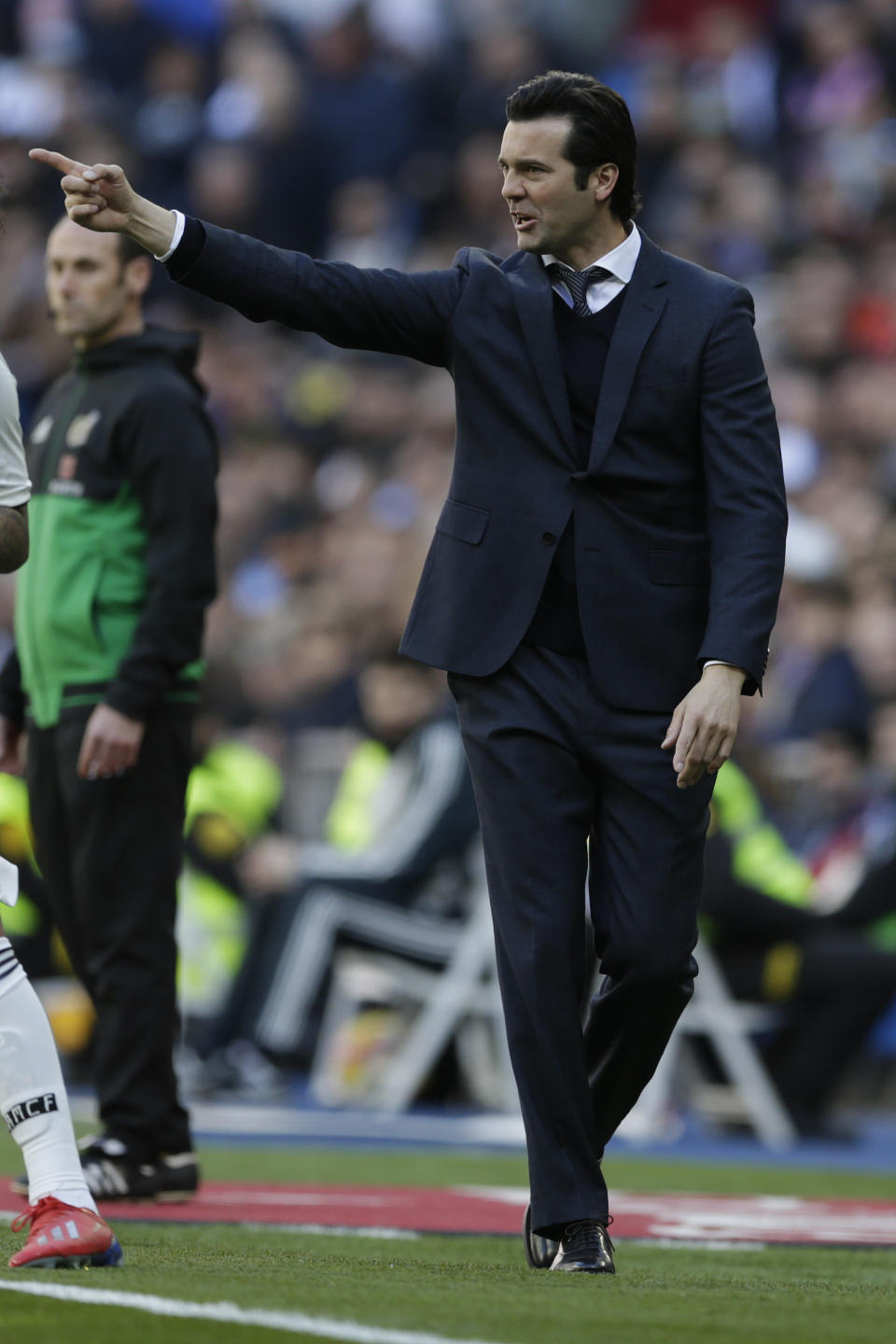 Real Madrid's head coach Santiago Solari shouts instructions during a La Liga soccer match between Real Madrid and Girona at the Bernabeu stadium in Madrid, Spain, Sunday, Feb. 17, 2019. (AP Photo/Andrea Comas)
