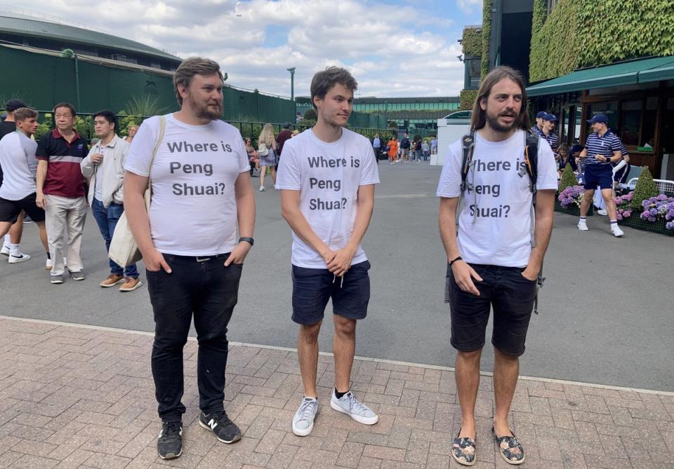 Protesters (left to right) Will Hoyles, 39, Caleb Compton, 27, and Jason Leith, 34, who all work for Free Tibet who have come to Wimbledon to draw attention to Peng Shuai (Rebecca Speare-Cole/PA) (PA Wire)