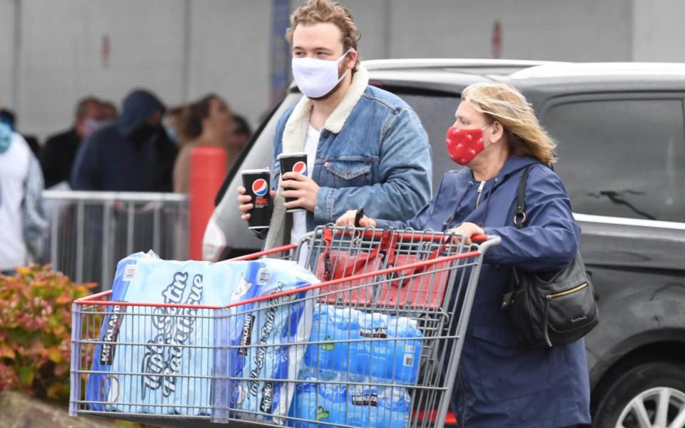 Shoppers at Costco Manchester on Saturday