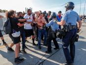 Protesters hand tanker truck driver ofver to police in Minneapolis