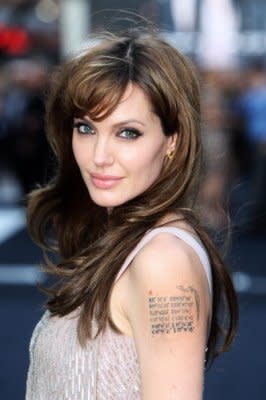 Angelina Jolie's arm tattoos signify where her children were born. Photo by Getty Images