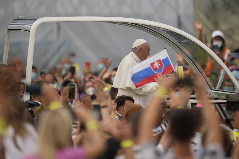Pope Francis meets with young people at Lokomotiva Stadium in Košice, Slovakia, Tuesday, Sept. 14, 2021. Francis first trip since undergoing intestinal surgery in July, marks the restart of his globetrotting papacy after a nearly two-year coronavirus hiatus. (AP Photo/Darko Vojinovic)