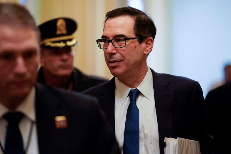 FILE PHOTO: U.S. Secretary of the Treasury Mnuchin walks from a meeting for a coronavirus relief package in Washington