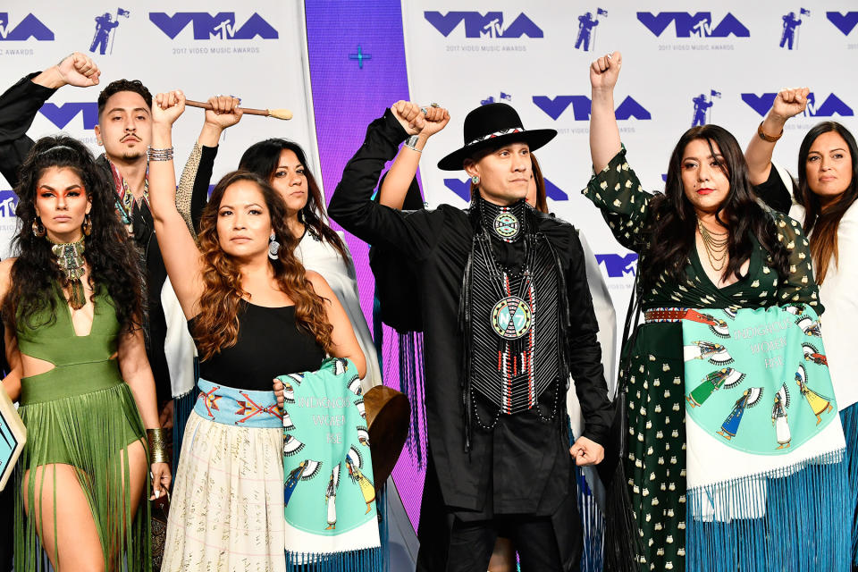 <p>Taboo of Black Eyed Peas, center, at the VMAs. (Photo: Frazer Harrison/Getty Images) </p>