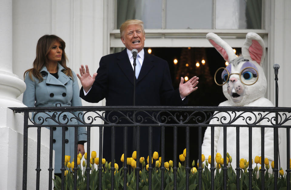 <p>U.S. President Donald Trump speaks to the crowd from the South Portico of the White House with first lady Melania Trump and the Easter Bunny at his sides as the annual White House Easter Egg Roll is held on the South Lawn of the White House in Washington, U.S., April 2, 2018. (Photo: Leah Millis/Reuters) </p>