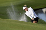 Nanna Koerstz Madsen of Denmark, chips onto the 18th green during the first round of the LPGA Walmart NW Arkansas Championship golf tournament, Friday, Sept. 24, 2021, in Rogers, Ark. (AP Photo/Michael Woods)