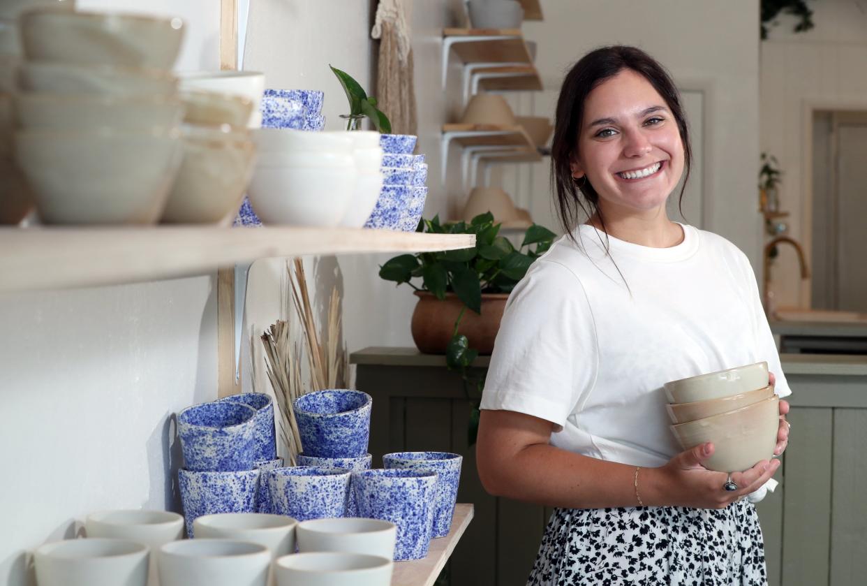 Owner Bella Lindell is shown at her Clintonville business, Lifestyle Pottery, which functions as a retail shop and studio where she holds pottery classes for guests.