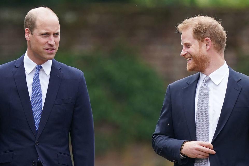 <p>YUI MOK/POOL/AFP via Getty Images</p> Prince William and Prince Harry in July 2021