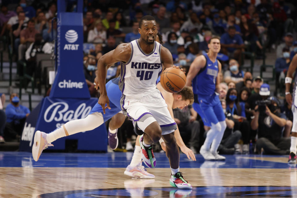 Sacramento Kings forward Harrison Barnes (40) takes off on a fast break after a turnover by Dallas Mavericks guard Luka Doncic during the second half of an NBA basketball game in Dallas, Sunday, Oct. 31, 2021. (AP Photo/Michael Ainsworth)