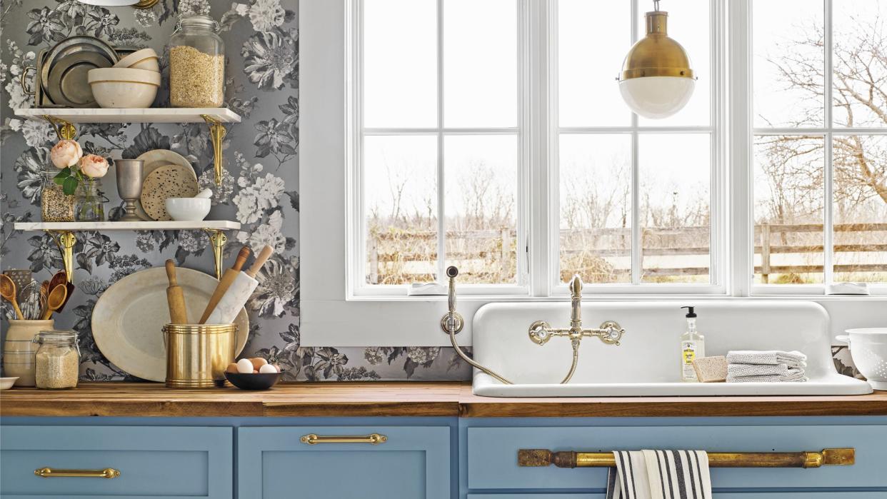 black and white kitchen with blue cabinets