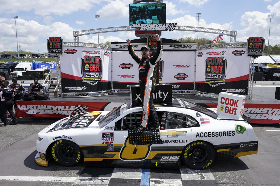 Josh Berry (8) celebrates winning the rain delayed NASCAR Xfinity Series auto race at Martinsville Speedway in Martinsville, Va., Sunday, April 11, 2021. (AP Photo/Steve Helber)