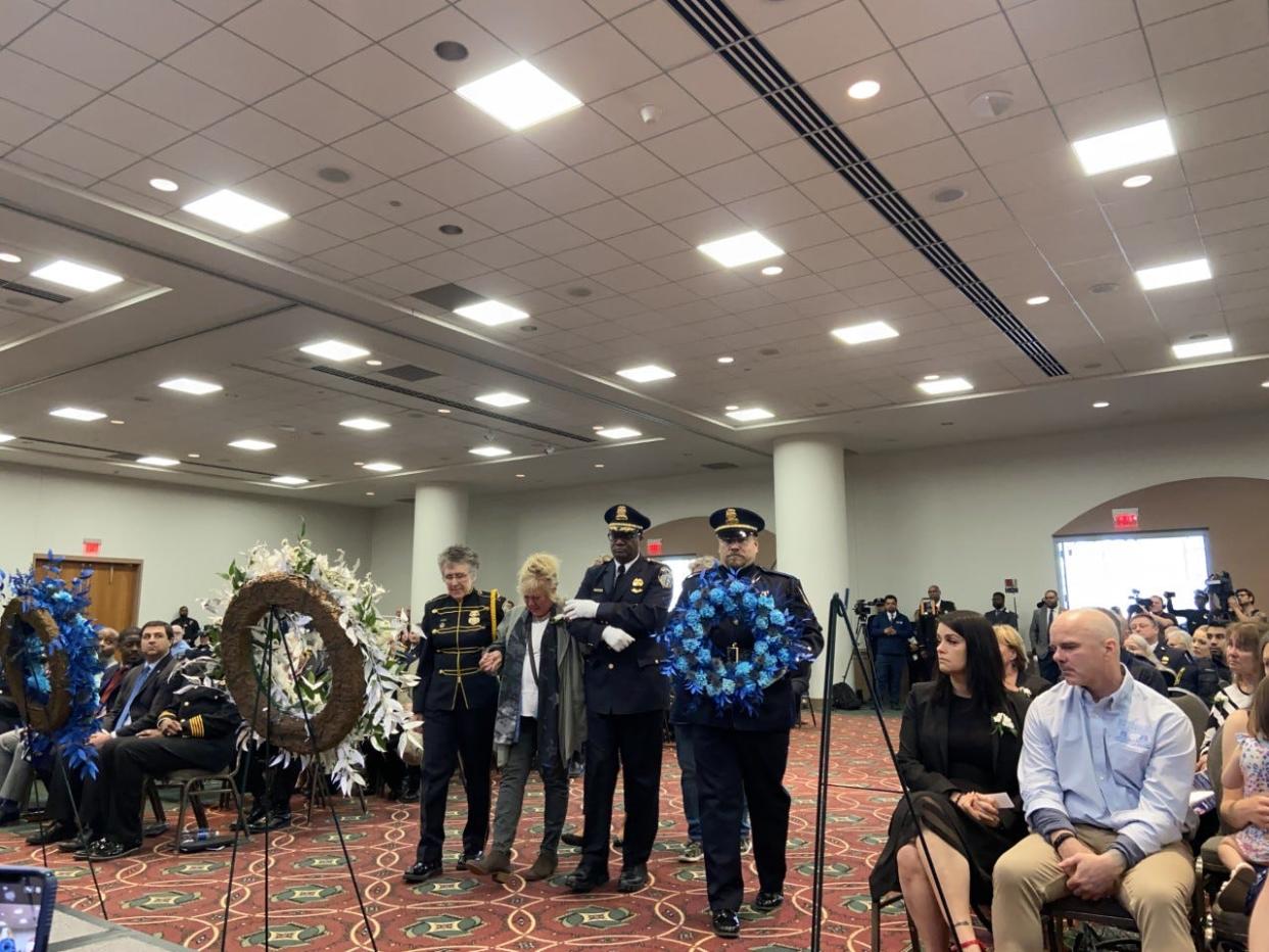 Milwaukee Police Chief Jeffrey Norman, right of center, escorts a family member of Michael Michalski during the annual Greater Milwaukee Law Enforcement Memorial Ceremony at the Wisconsin Center on Friday, May 5. Michalski, 52, was shot and killed in the line of duty in 2018.