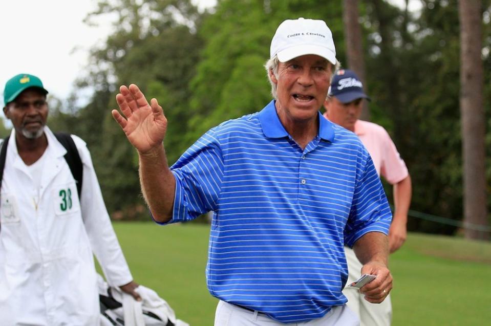 Ben Crenshaw walks off the 18th green after playing his final Masters during the second round of the 2015 Masters Tournament at Augusta National Golf Club.