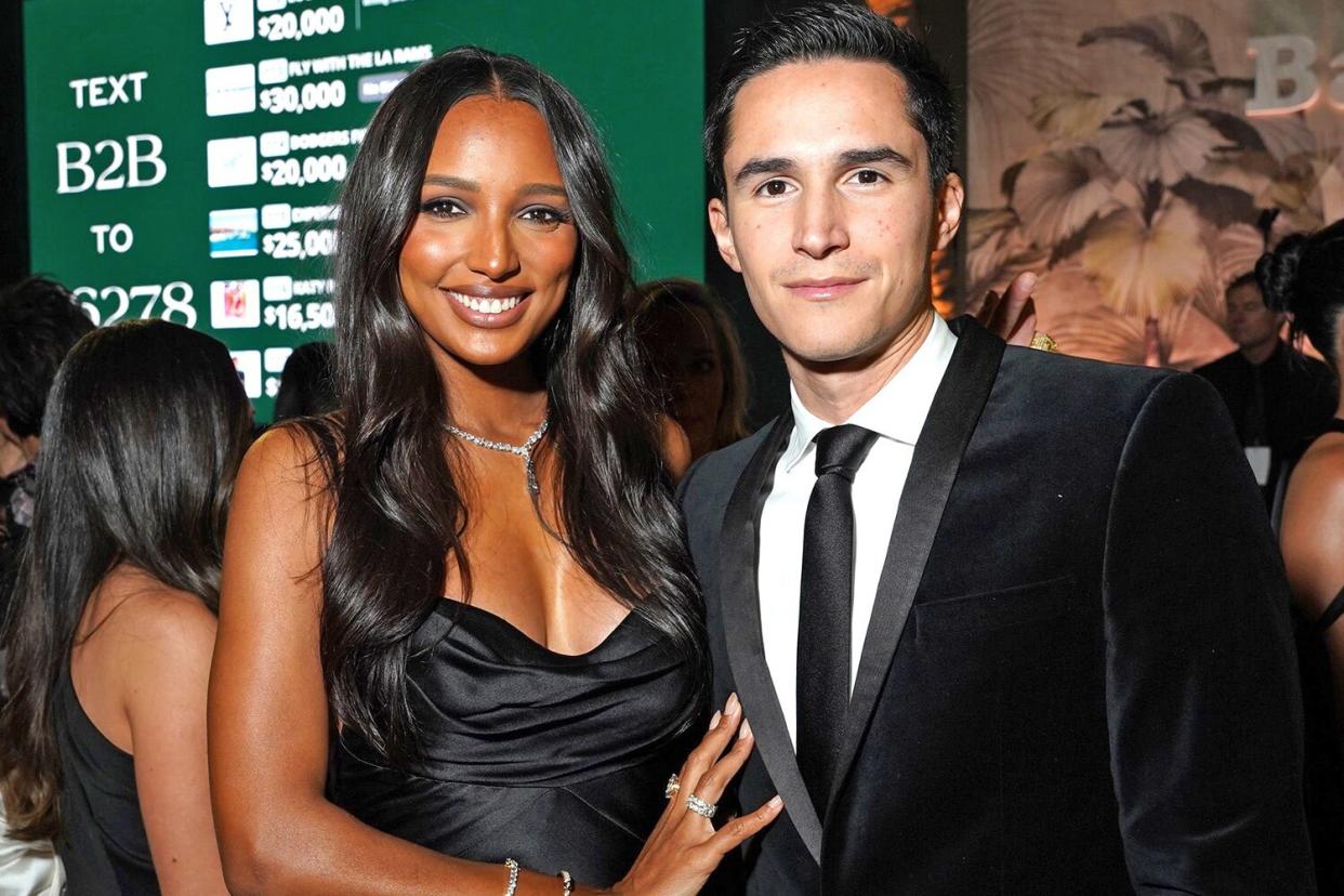 WEST HOLLYWOOD, CALIFORNIA - NOVEMBER 12: (L-R) Jasmine Tookes and Juan David Borrero attend the 2022 Baby2Baby Gala presented by Paul Mitchell at Pacific Design Center on November 12, 2022 in West Hollywood, California. (Photo by Presley Ann/Getty Images for Baby2Baby)