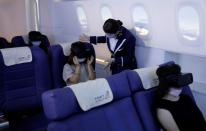 Customers take VR flight experiences at First Airlines in Tokyo