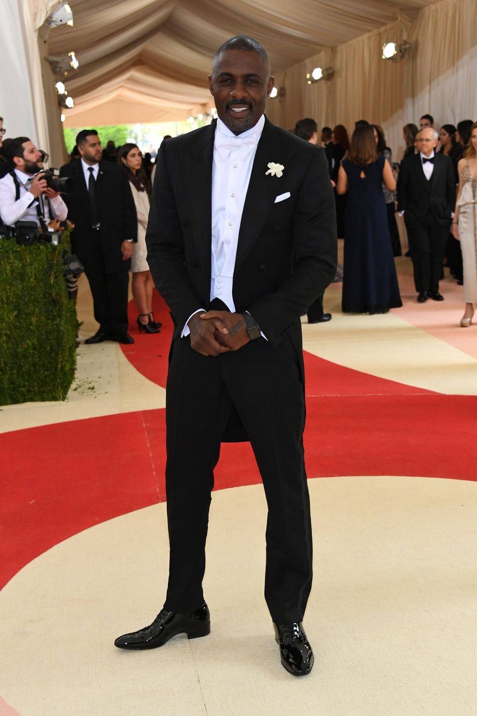 <h1 class="title">Idris Elba in Tom Ford</h1><cite class="credit">Photo: Getty Images</cite>