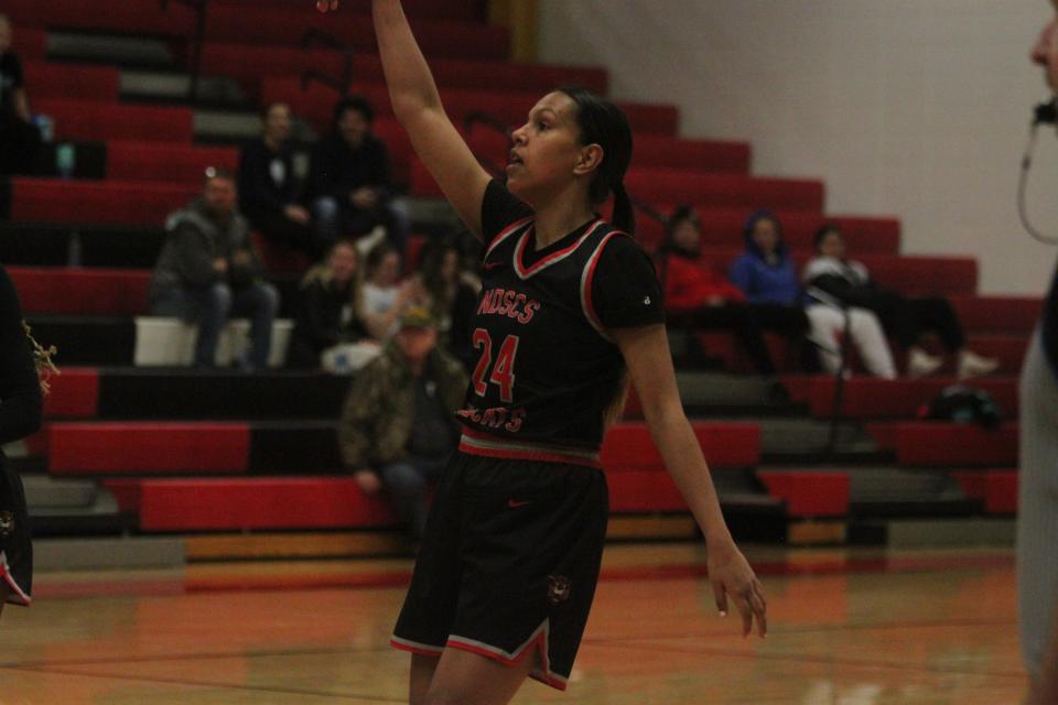 North Dakota State College of Science guard Ambah Kowcun finishes her release on a three-point attempt against Lake Region State on Jan. 19.